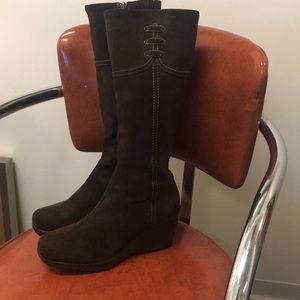 Suede boots with wedge heel.